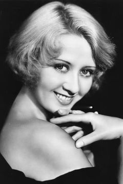 Joan Blondell interpreta Dolly Kenyon