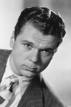 Jackie Cooper interpreta Perry White