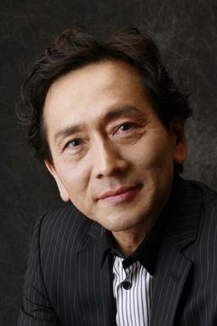 Kenichi Yajima interpreta Director of Nuclear and Industrial Safety Agency