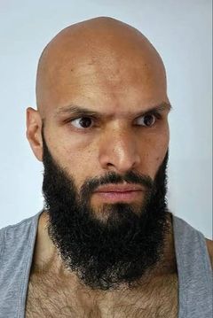 Yusuf Chaudhri interpreta Nikolai's Bodyguard