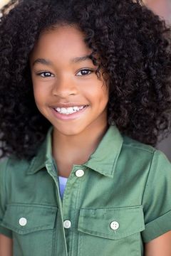 Akira Akbar interpreta Monica Rambeau (11 Years Old)