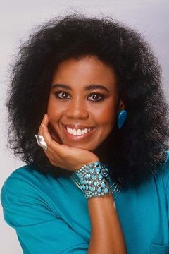Sharon Brown interpreta Kim