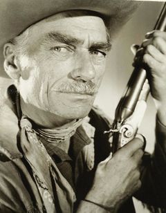 Robert Adler interpreta Guard (uncredited)