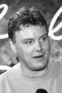 Rick Ducommun interpreta Prison Guard
