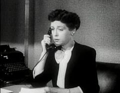 Isabel Withers interpreta Woman Before Pawn Shop (uncredited)