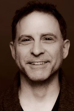 David Deblinger interpreta NYU Professor