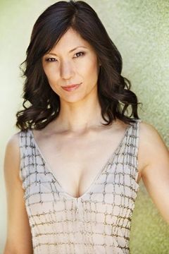 Jodi Fung interpreta Reporter (uncredited)