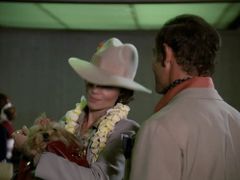 Tricia O'Neil interpreta Woman