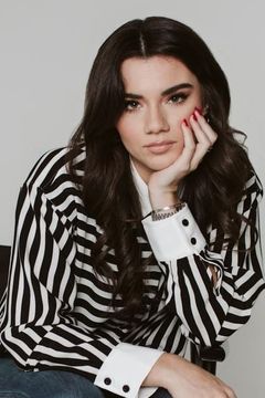 Brett Cooper interpreta Speech Student (uncredited)