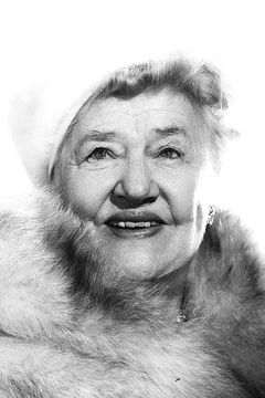 Marjorie Bennett interpreta Miss Lark - Old Woman in Park