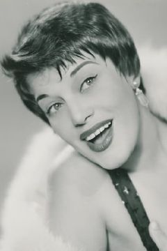 Kaye Ballard interpreta Coach Betsy