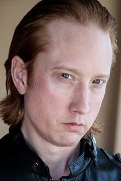 Steve Trzaska interpreta Randy Buechler