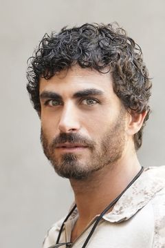 Justin Melnick interpreta Brock