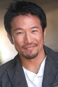 Adam Wang interpreta Dean Witter Trader (uncredited)