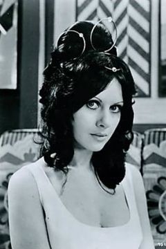 Valli Kemp interpreta Woman at Party (uncredited)